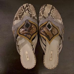 Miu Miu exotic slip on sandals.